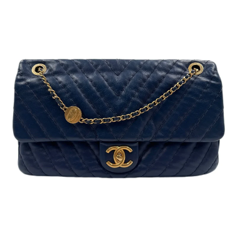 CHANEL CHEVRON MEDALLION CHARM FLAP BAG